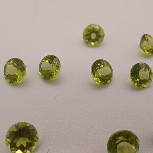 Natural 5mm Peridot 5.07 CT 9pcs. VS Gemstones